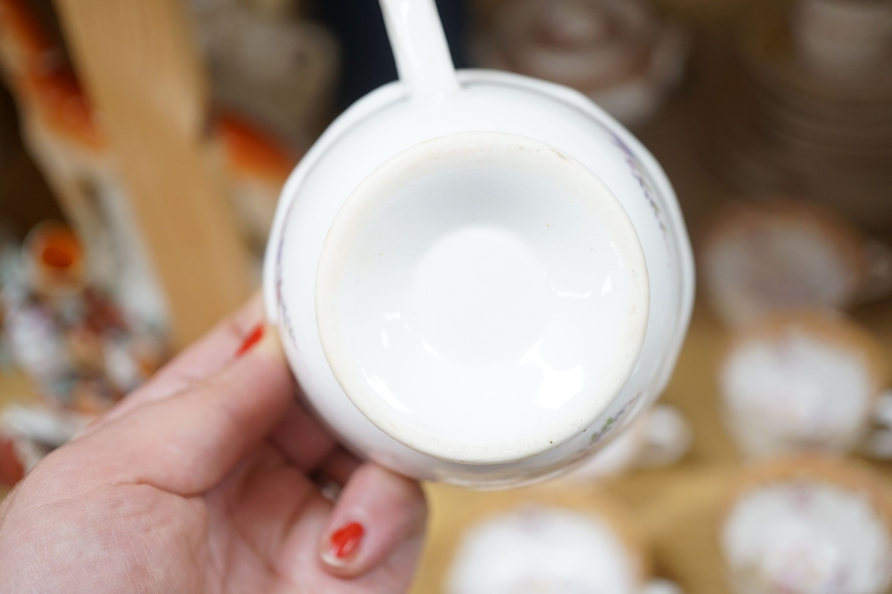 A Victorian porcelain tea service and two coffee cans